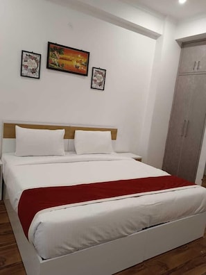 Deluxe Room, Balcony | In-room safe, desk, laptop workspace, free WiFi