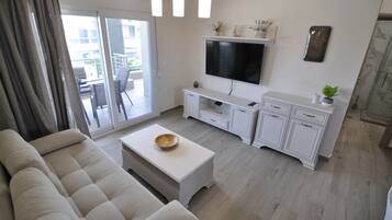 Family Apartment, 2 Bedrooms | Living area | Flat-screen TV