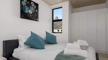 Apartment, 2 Bedrooms | In-room safe, individually decorated, laptop workspace, blackout drapes