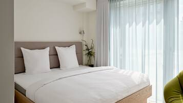 2 habitaciones, tabla de planchar con plancha, cuna de viaje y wifi