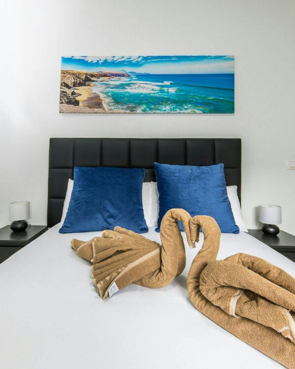 2 quartos, ferros/tábuas de passar roupa, Wi-Fi, roupa de cama