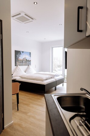 Double Room | Private kitchen | Fridge, microwave, coffee/tea maker, electric kettle