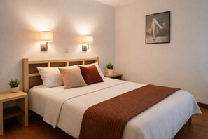 1 chambre, coffres-forts dans les chambres, fer et planche à repasser