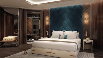 A modern bedroom with a large bed, a wardrobe, a vanity, and a suitcase on the floor.