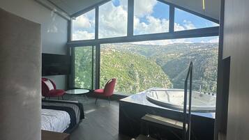 Deluxe Double Room, Mountain View | In-room safe, iron/ironing board, free WiFi