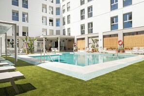 Seasonal outdoor pool, open 11:00 AM to 8:00 PM, lifeguards on site - LAN Suites (Lepe)