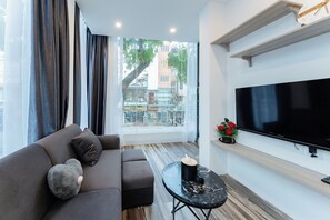 City Apartment | Living area | 42-inch Smart TV with cable channels - Su Casa Hanoi Old Quarter (Hanoi)