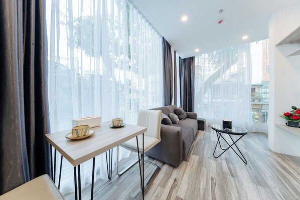 City Apartment | Living area | 42-inch Smart TV with cable channels - Su Casa Hanoi Old Quarter (Hanoi)