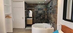 Jetted bath, hair dryer, towels, soap