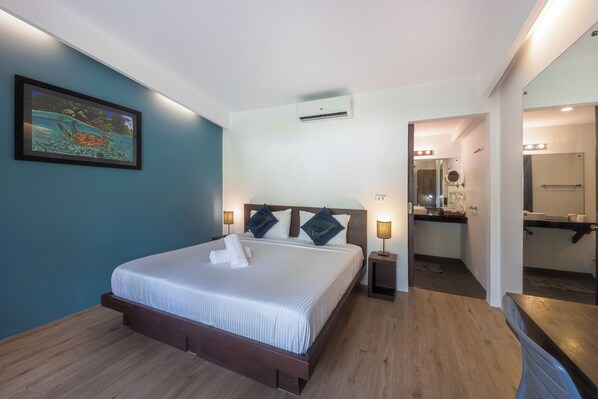 Deluxe Double Room, Pool View | In-room safe, laptop workspace, blackout drapes, free WiFi