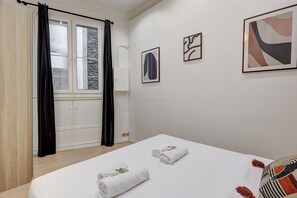 1 bedroom, desk, iron/ironing board, travel crib