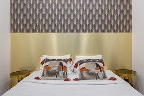 1 bedroom, desk, iron/ironing board, travel crib