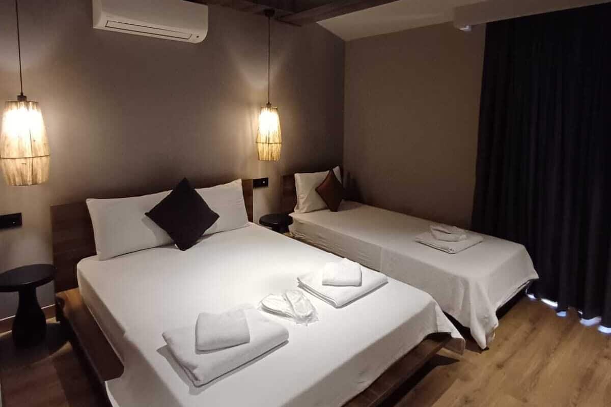 家庭三人房 | 埃及棉床单、高档床上用品、免费 WiFi、床单