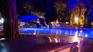 Seasonal outdoor pool, open 7:00 AM to 7:00 PM, free pool cabanas