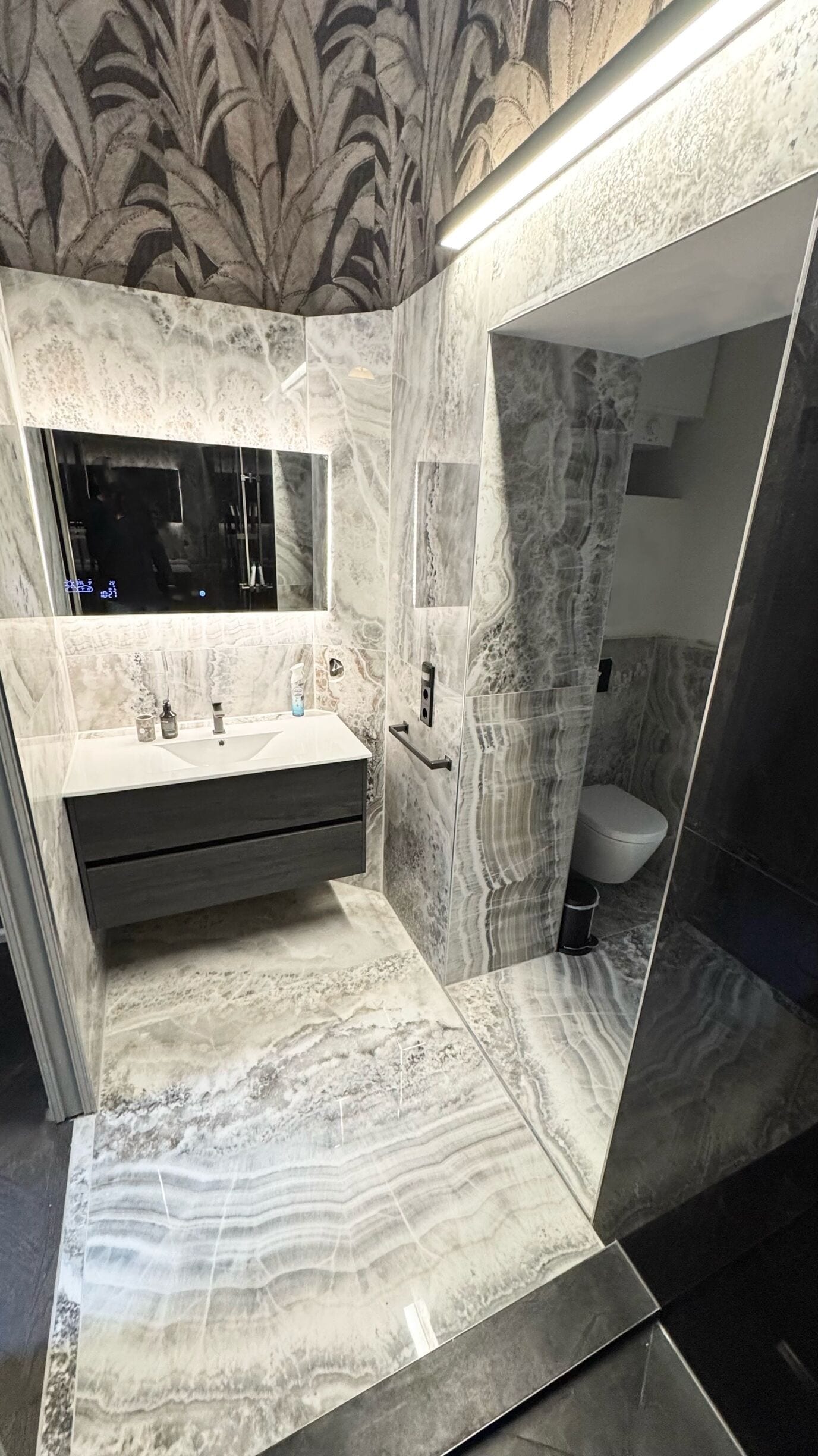 Shower, hair dryer, towels, toilet paper