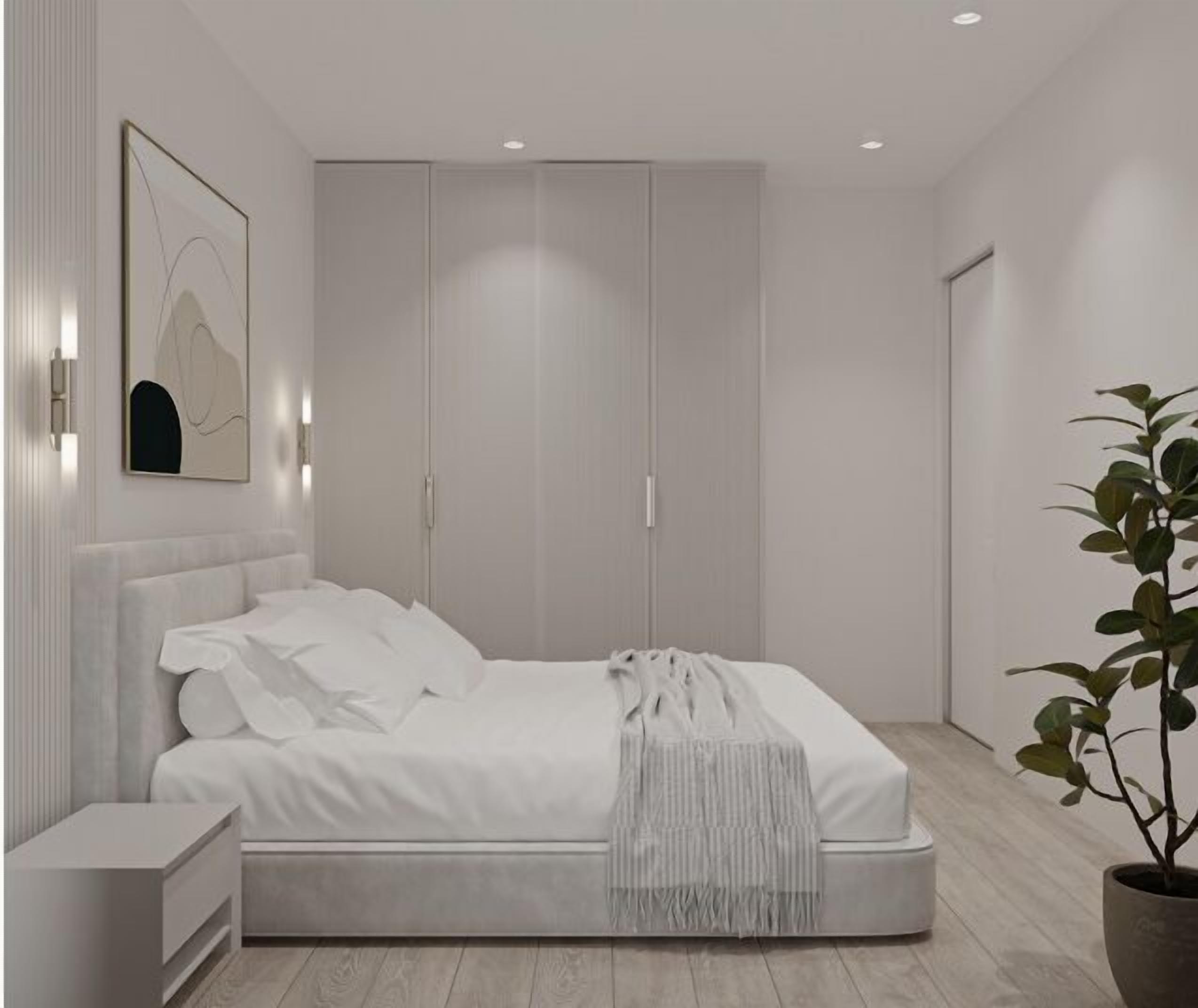 Une chambre à coucher moderne avec un grand lit, une table de chevet, une armoire et une plante en pot.