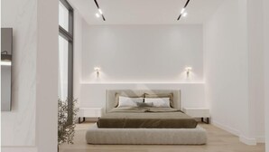 A modern bedroom with a large bed, bedside tables, and wall-mounted lighting. - Sololaki Hills (Tbilisi)