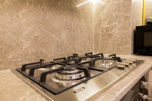 Fridge, microwave, oven, stovetop - 2 Bed Apt in La Riviera, JVC (Dubai)