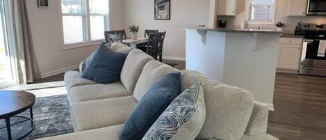 Comfort House, 3 Bedrooms, Non Smoking, Fireplace | Living room | 65-inch Smart TV with cable channels, fireplace, Netflix