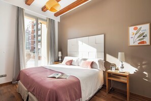 Apartamento superior | Cofres nos quartos, cortinas blackout, ferros/tábuas de passar roupa