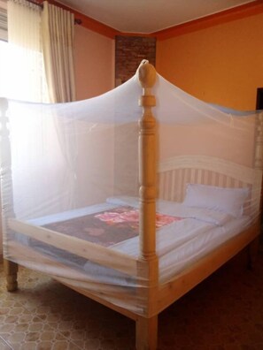 Basic Double Room Single Use, Balcony, Garden View | In-room safe, desk, blackout drapes, soundproofing - Paradise Hotel Kirinya (Seeta)