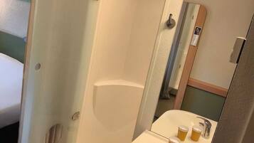 Shower, rainfall showerhead, hair dryer, towels