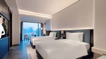 Luksushuone, 2 yhden hengen sänkyä, kaupunkinäköala | Tallelokero huoneessa, työpöytä, ilmainen Wi-Fi, vuodevaatteet