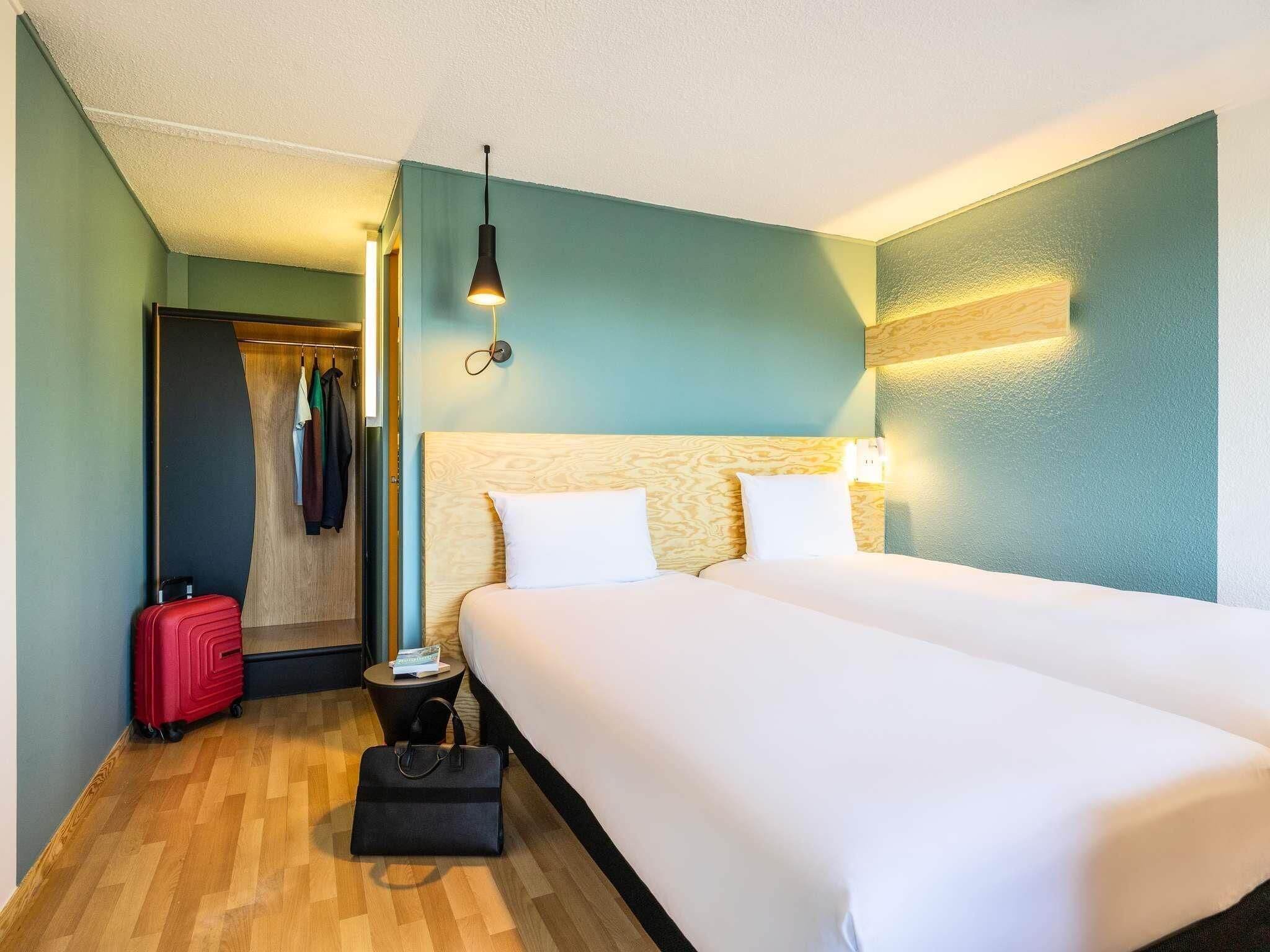 Chambre Économique, 2 lits une place | Chambres insonorisées, draps fournis