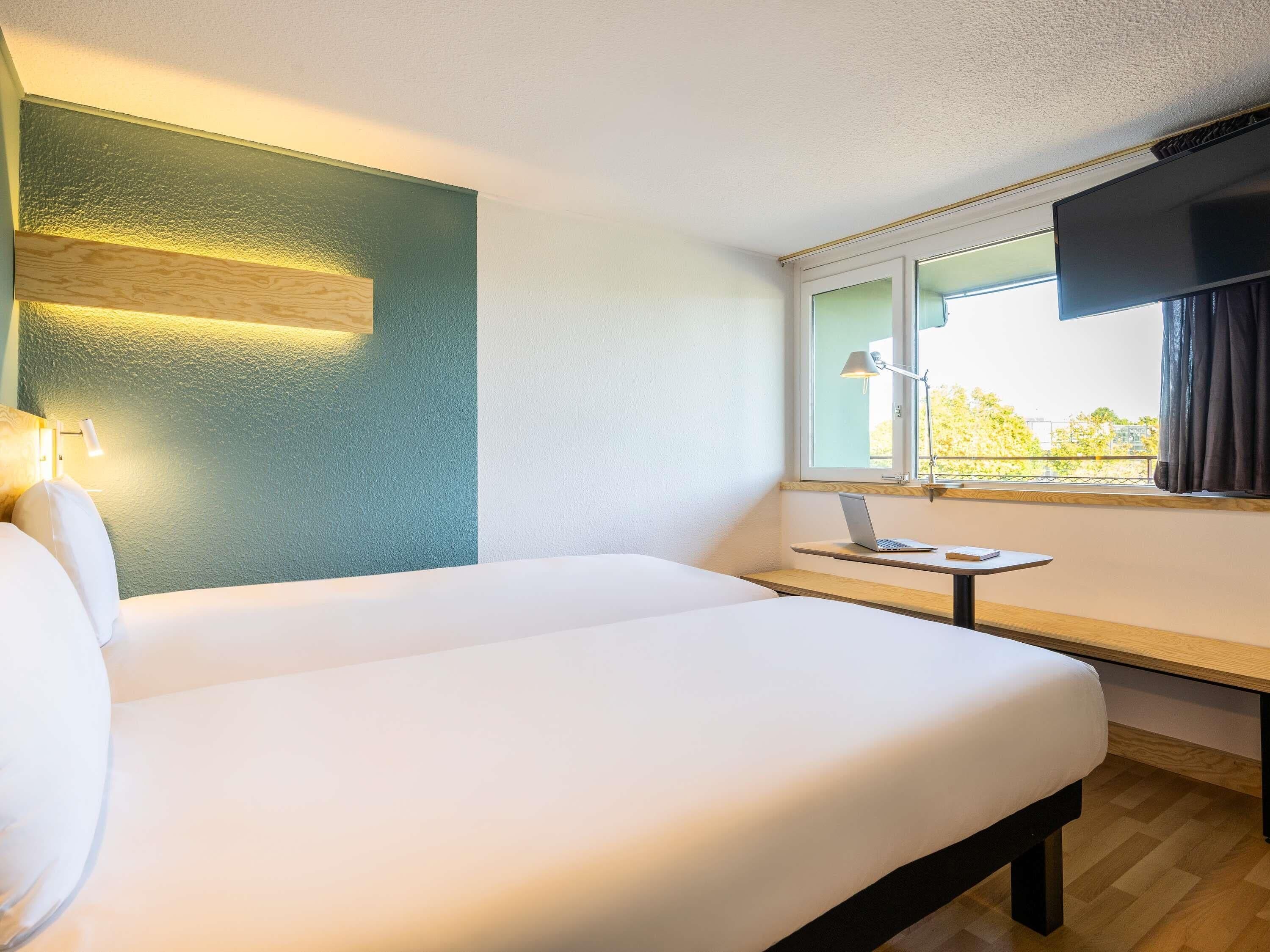 Economy-Zimmer, 2 Einzelbetten | Schallisolierte Zimmer, Bettwäsche