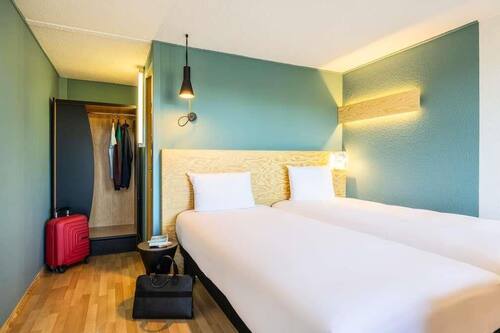 Chambre économique, 2 lits jumeaux | Système d’insonorisation, literie fournie