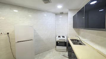 Chambre Double Standard | Cuisine privée | Réfrigérateur, micro-ondes, four, plaque de cuisson