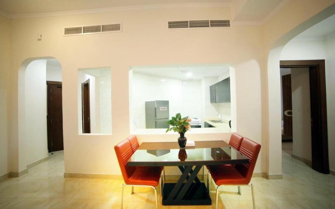 Habitación estándar doble | Zona de estar | Una televisión de pantalla plana