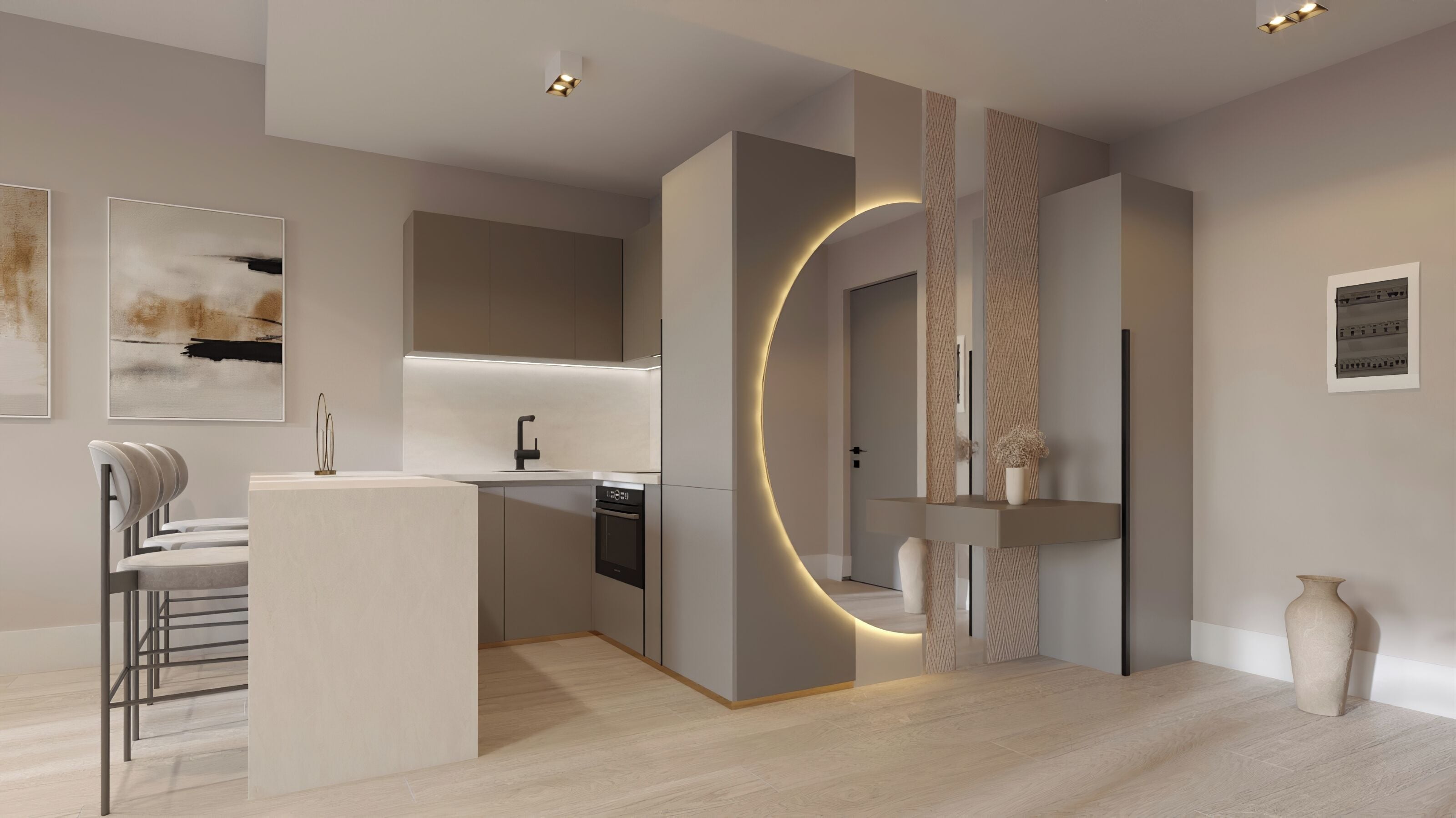 Una cocina moderna con horno empotrado, pileta y un elemento de iluminación curva. Hay un comedor con mesa y sillas blancas.