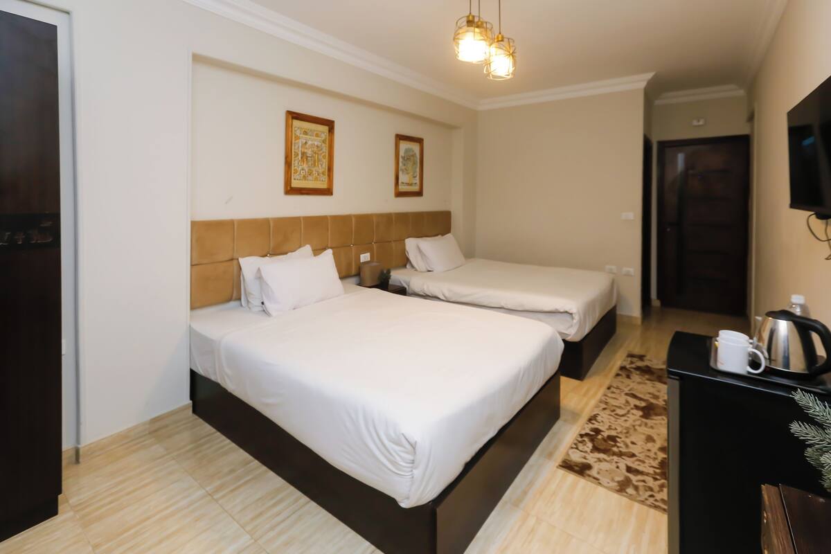 Family Room | Premium bedding, memory foam beds, minibar, desk