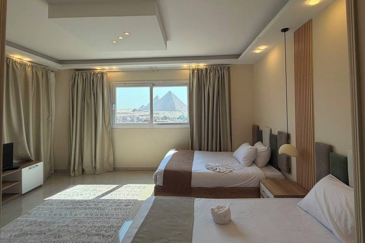 Family Quadruple Room, Mountain View | Premium bedding, memory foam beds, minibar, desk
