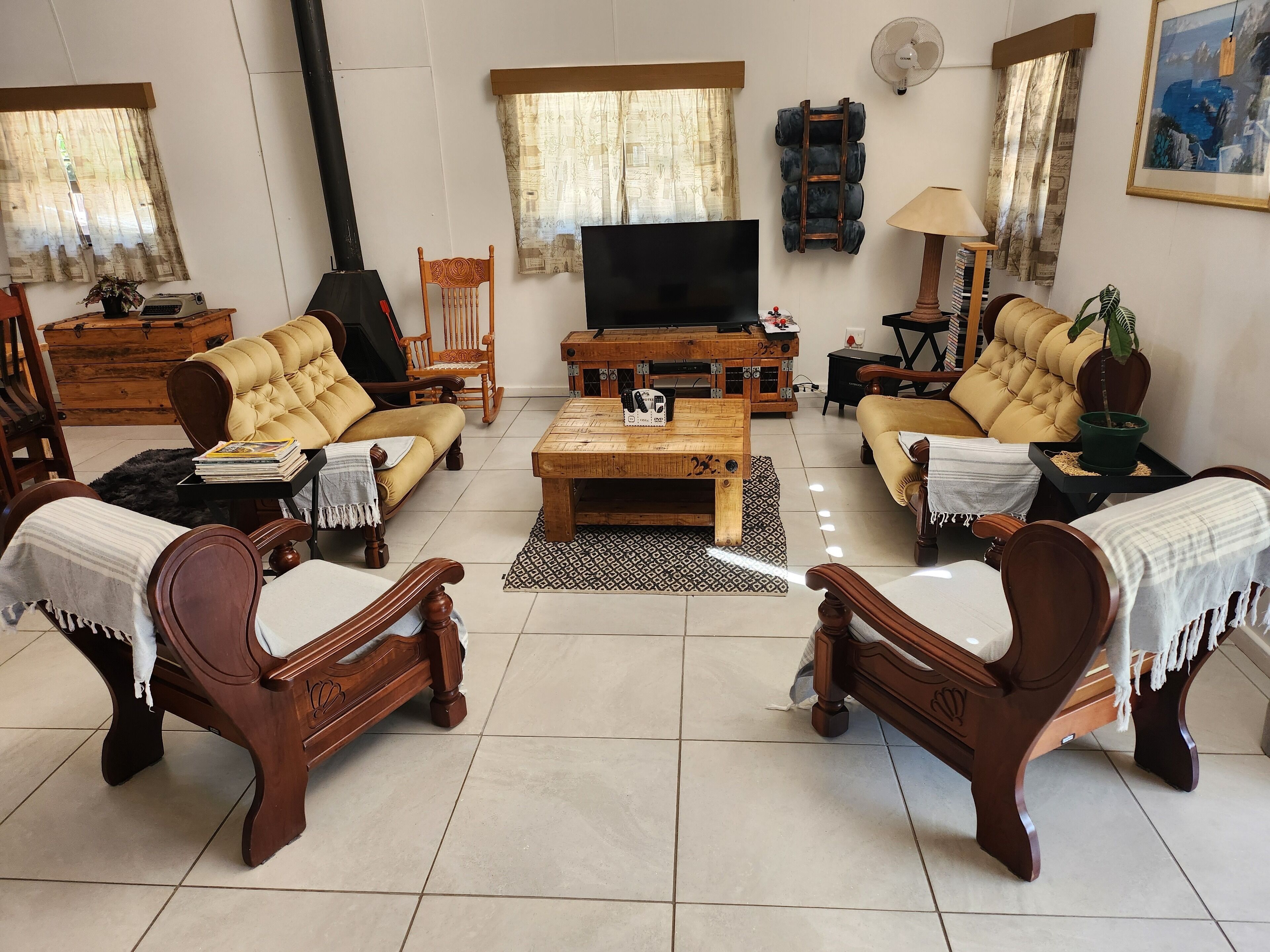 50-inch LED TV with satellite channels, fireplace, video game console