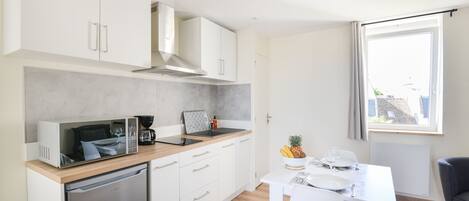 Fridge, microwave, coffee/tea maker, toaster