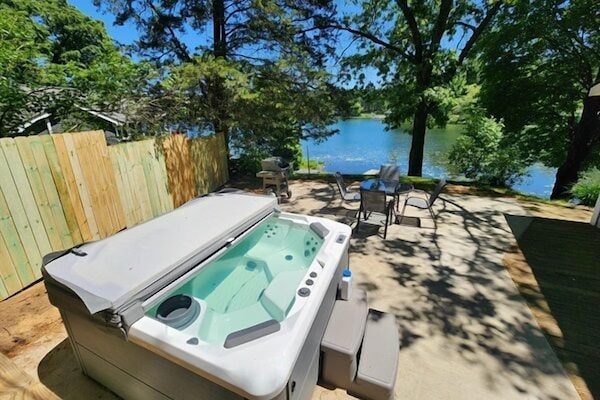 Hot tub overlooking the lake.