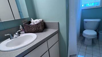 Hair dryer, towels, soap, shampoo