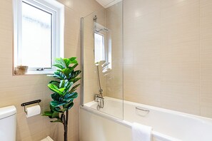Basic House | Bathroom | Hair dryer, towels, soap, shampoo - Semi-detached House With Modern Bespoke Interior (London)