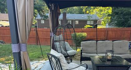 Cozy Ranch Style home with sun porch, above ground pool with fenced yard