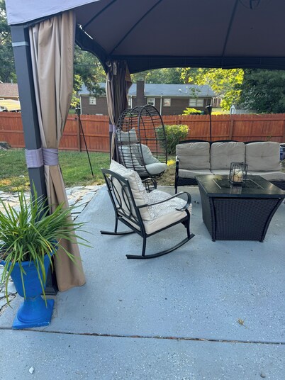 Cozy Ranch Style home with sun porch, above ground pool with fenced yard