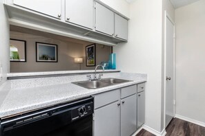 Fridge, microwave, oven, stovetop - Green Oasis: Stylish 1BR Retreat/ Medical Center (San Antonio)