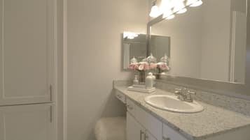 Hair dryer, towels, soap, toilet paper