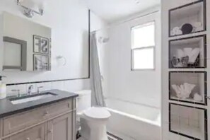 Hair dryer, towels, soap, shampoo