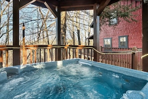 Outdoor spa tub - Cozy Cabin w/ 2 King Beds, Fireplace, Hot Tub, Foosball, Arcade and BBQ! (Sevierville)