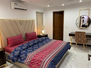 Deluxe Double Room | Soundproofing, iron/ironing board, free WiFi - Bloom Family Suites (Lahore)