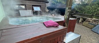 The hot tub by the waterfall - facilities included