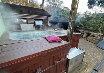 The hot tub by the waterfall - facilities included