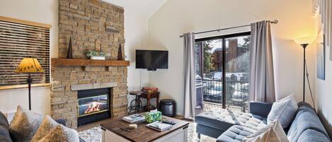 Smart TV, fireplace, DVD player, books